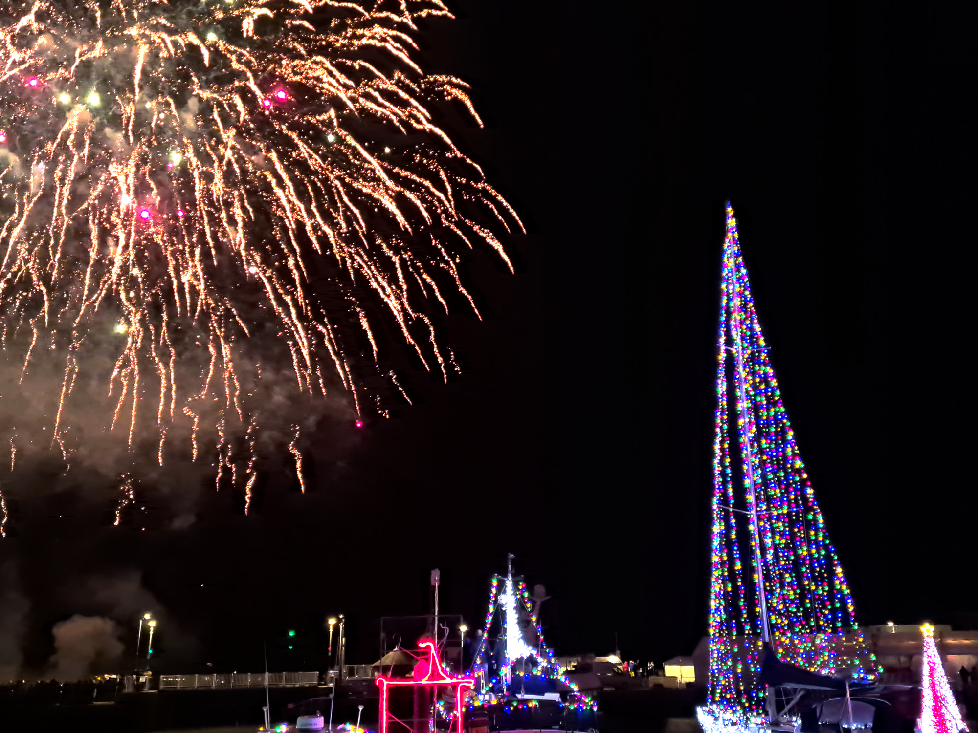 Fireworks lighting up Padstow Harbour during Padstow Christmas Fayre